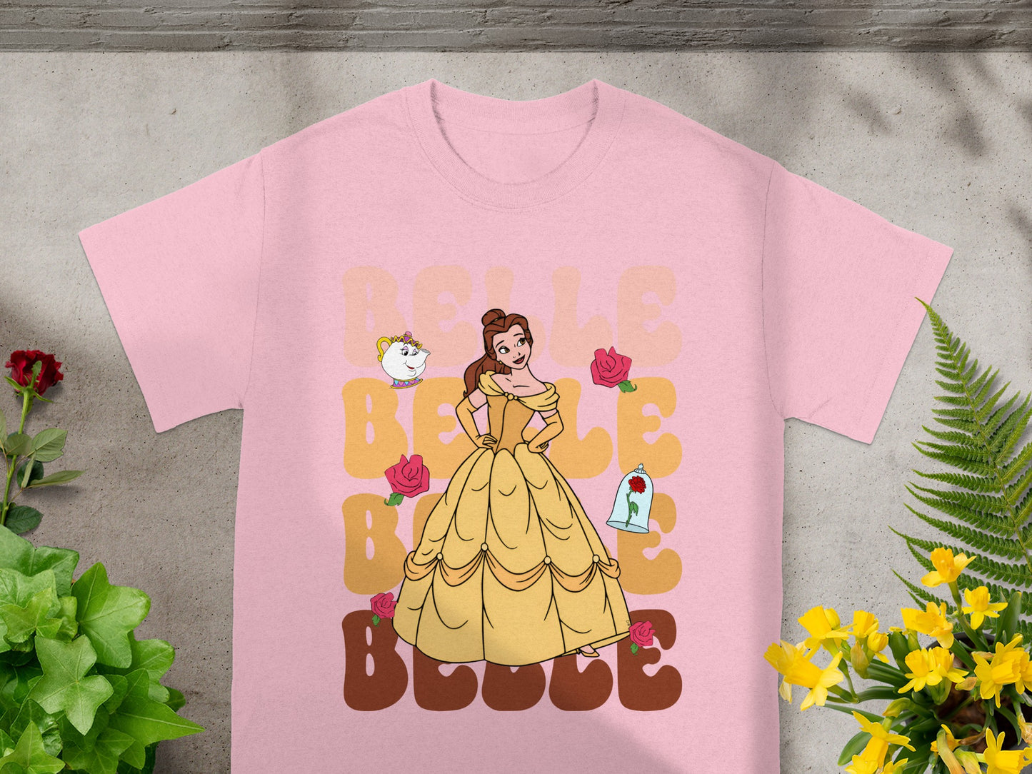 Belle from Beauty and the Beast on pink t-shirt with roses and teapot graphic.