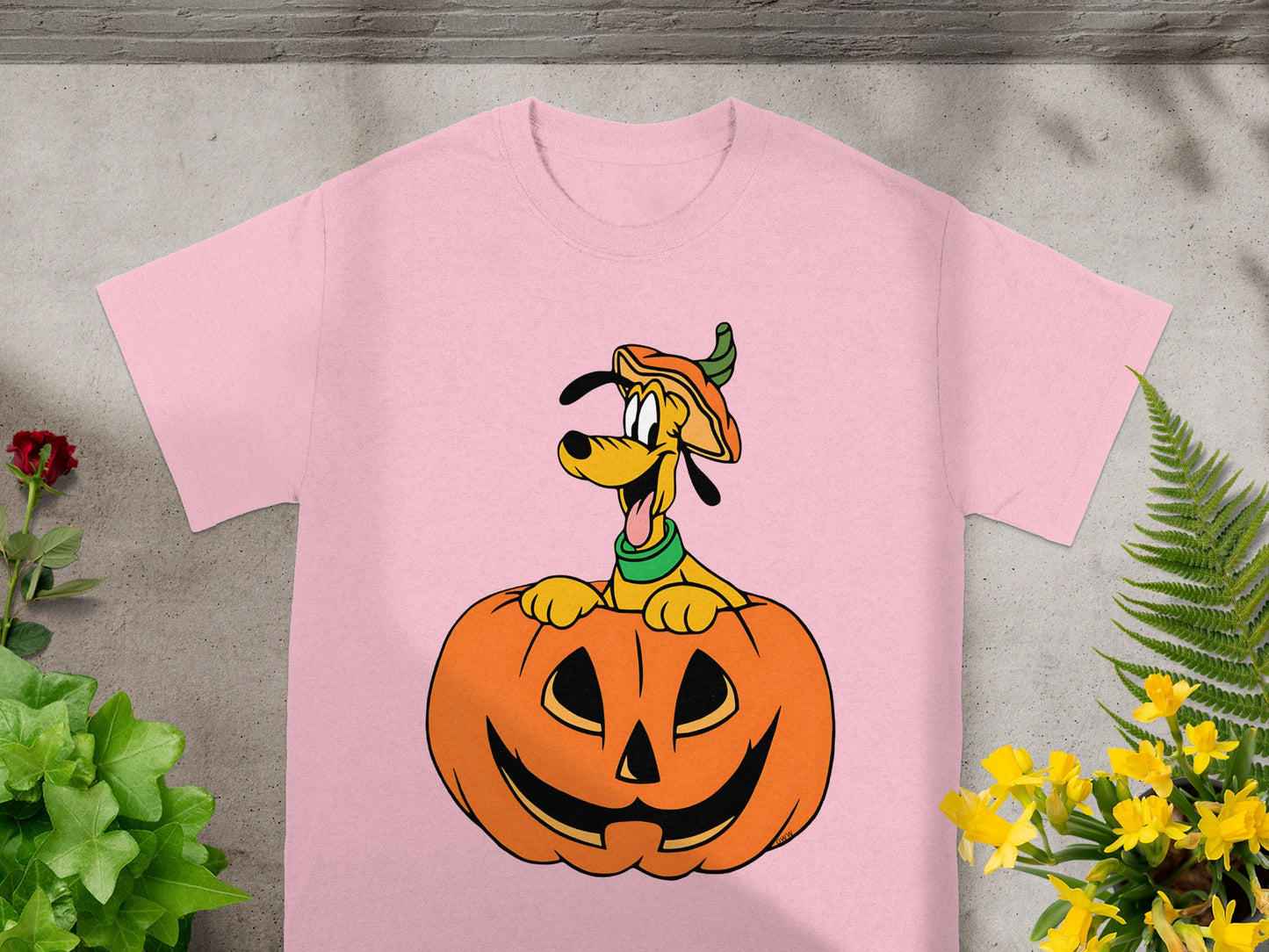 Pink t-shirt with Pluto in a jack-o'-lantern and pumpkin hat.