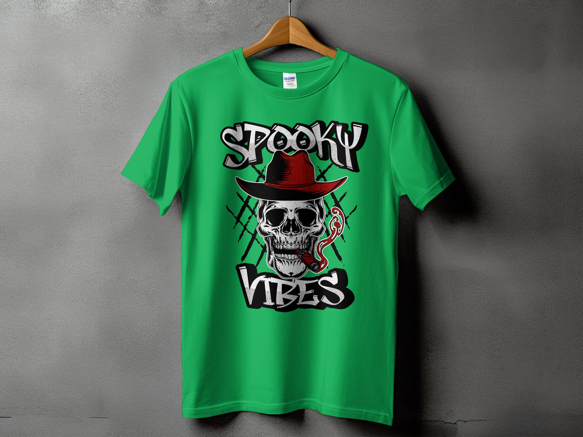 Green t-shirt with a skull in a hat smoking a cigar and text "Spooky Vibes".