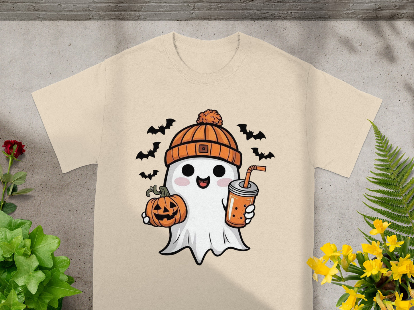 Cute ghost wearing an orange beanie holding a pumpkin and bubble tea with bats.