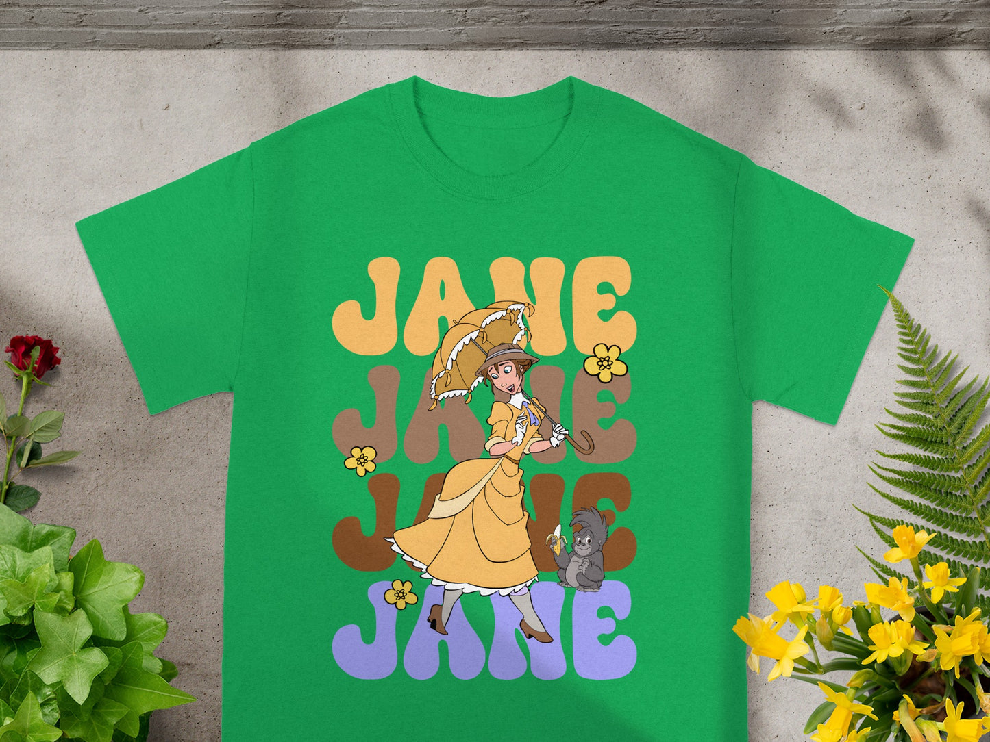 Green t-shirt with "JANE" text and illustration of a woman with a parasol.
