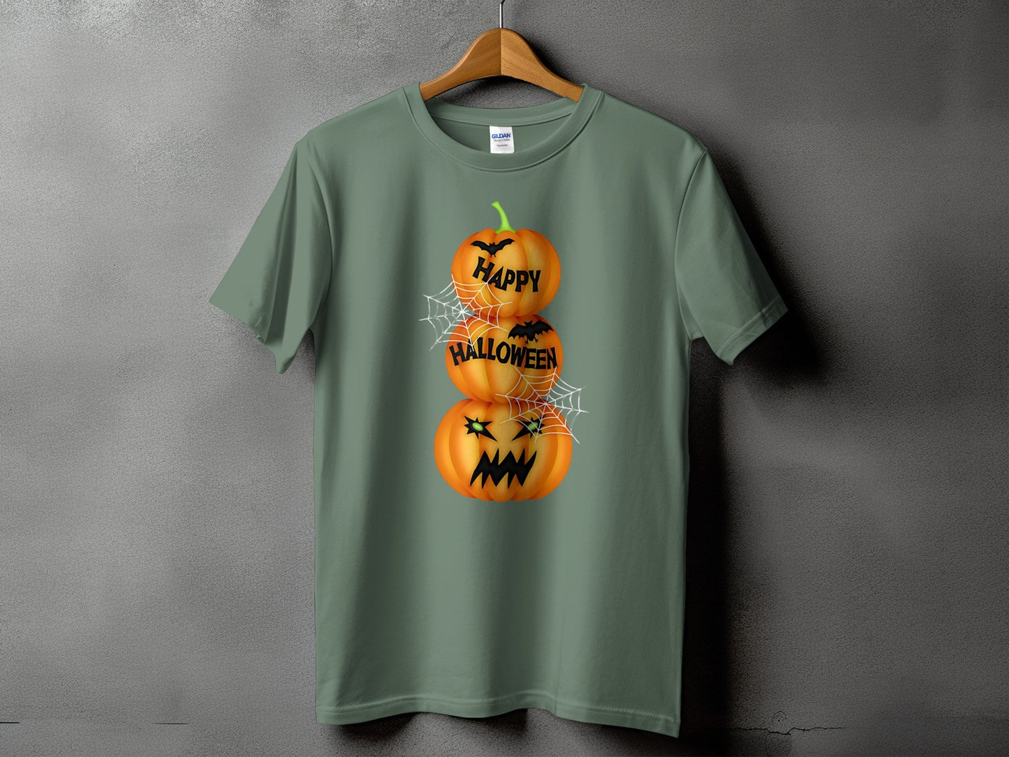 Green t-shirt with stacked jack-o'-lanterns and text reading "Happy Halloween."