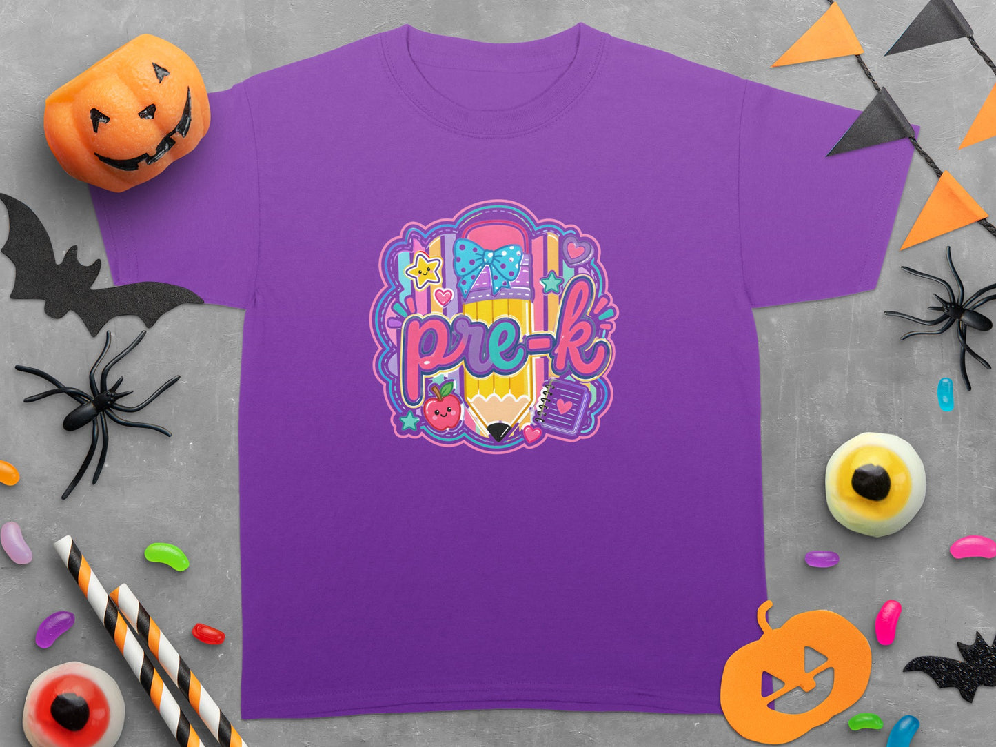 Purple t-shirt with a colorful "pre-k" graphic featuring a pencil and school supplies.