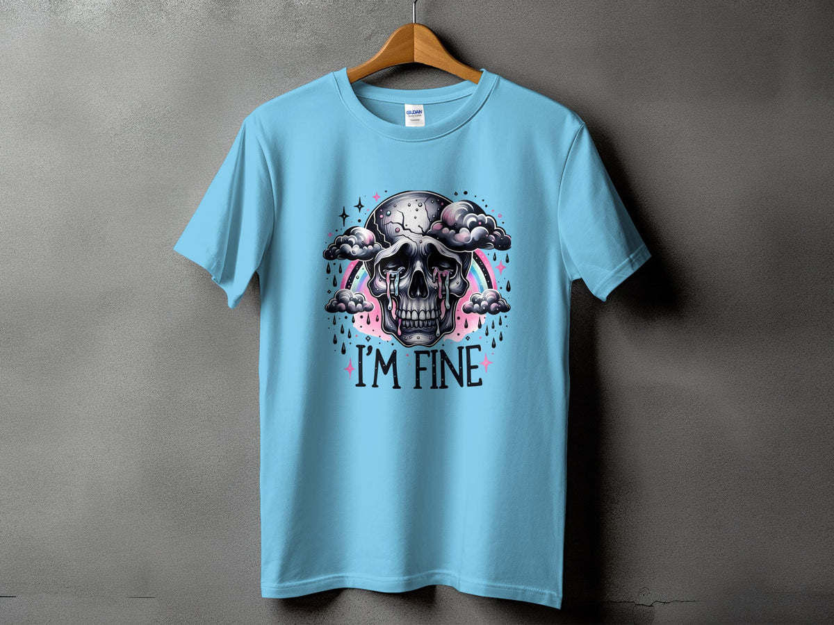 Light blue t-shirt with a crying skull, clouds, rainbow, and "I'M FINE" text.