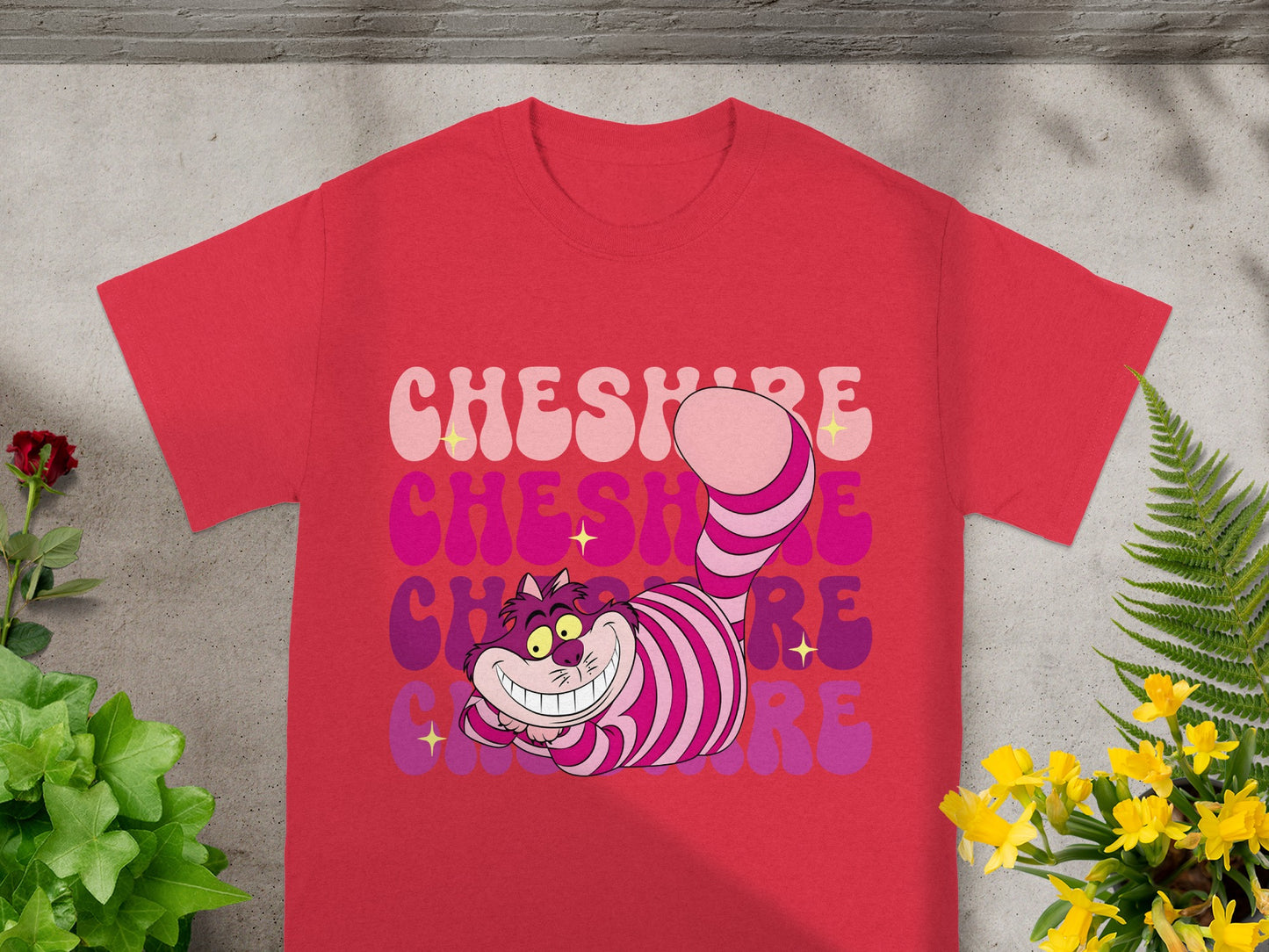 Red t-shirt with "Cheshire" in colorful, layered lettering.