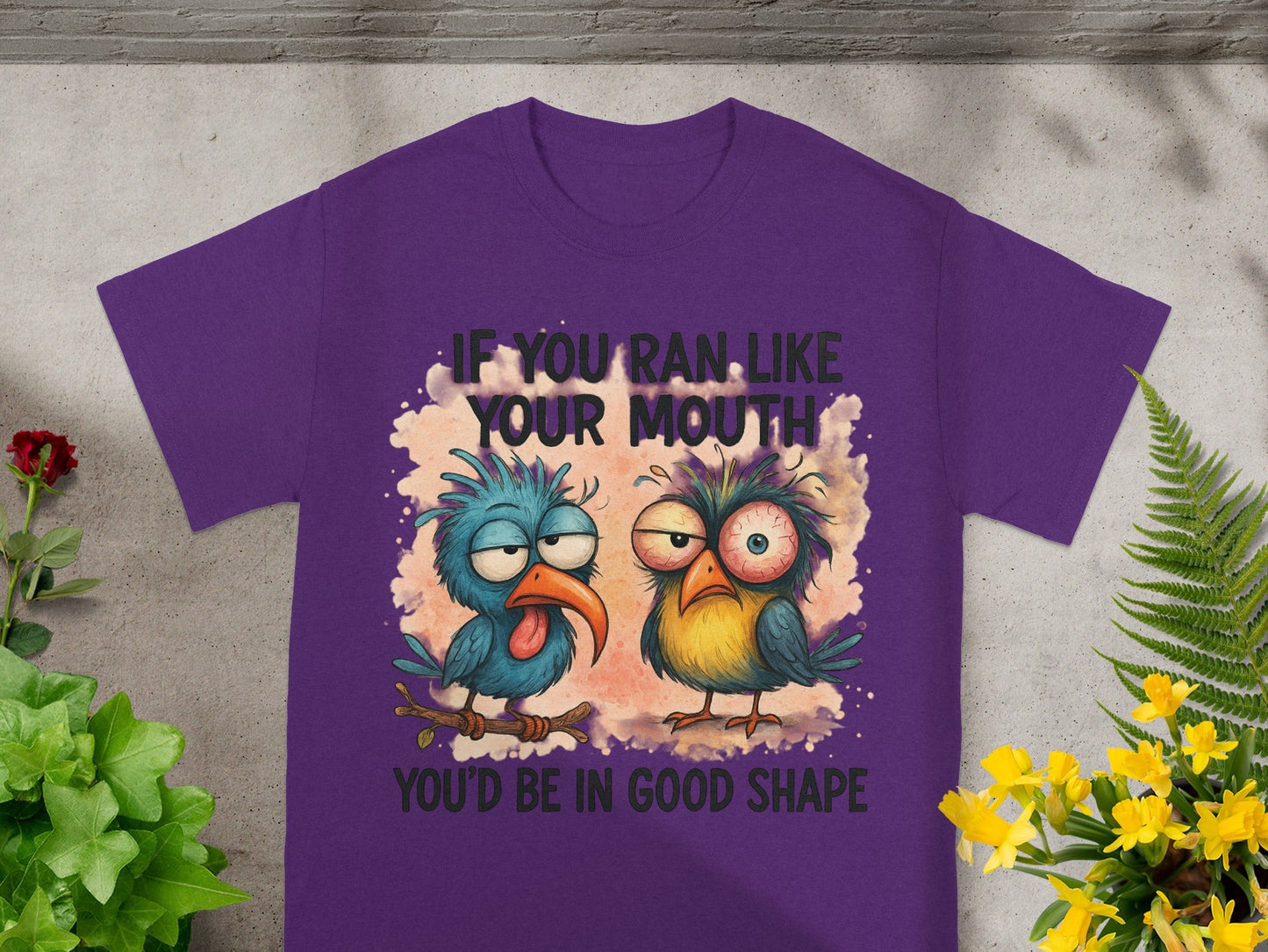Purple t-shirt with cartoon birds and text: "If you ran like your mouth you'd be in good shape."