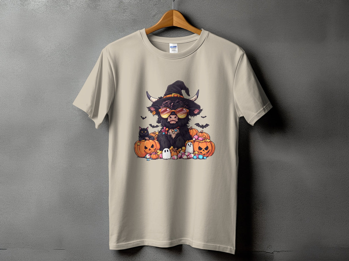 Highland cow in witch hat and sunglasses surrounded by pumpkins and ghosts.
