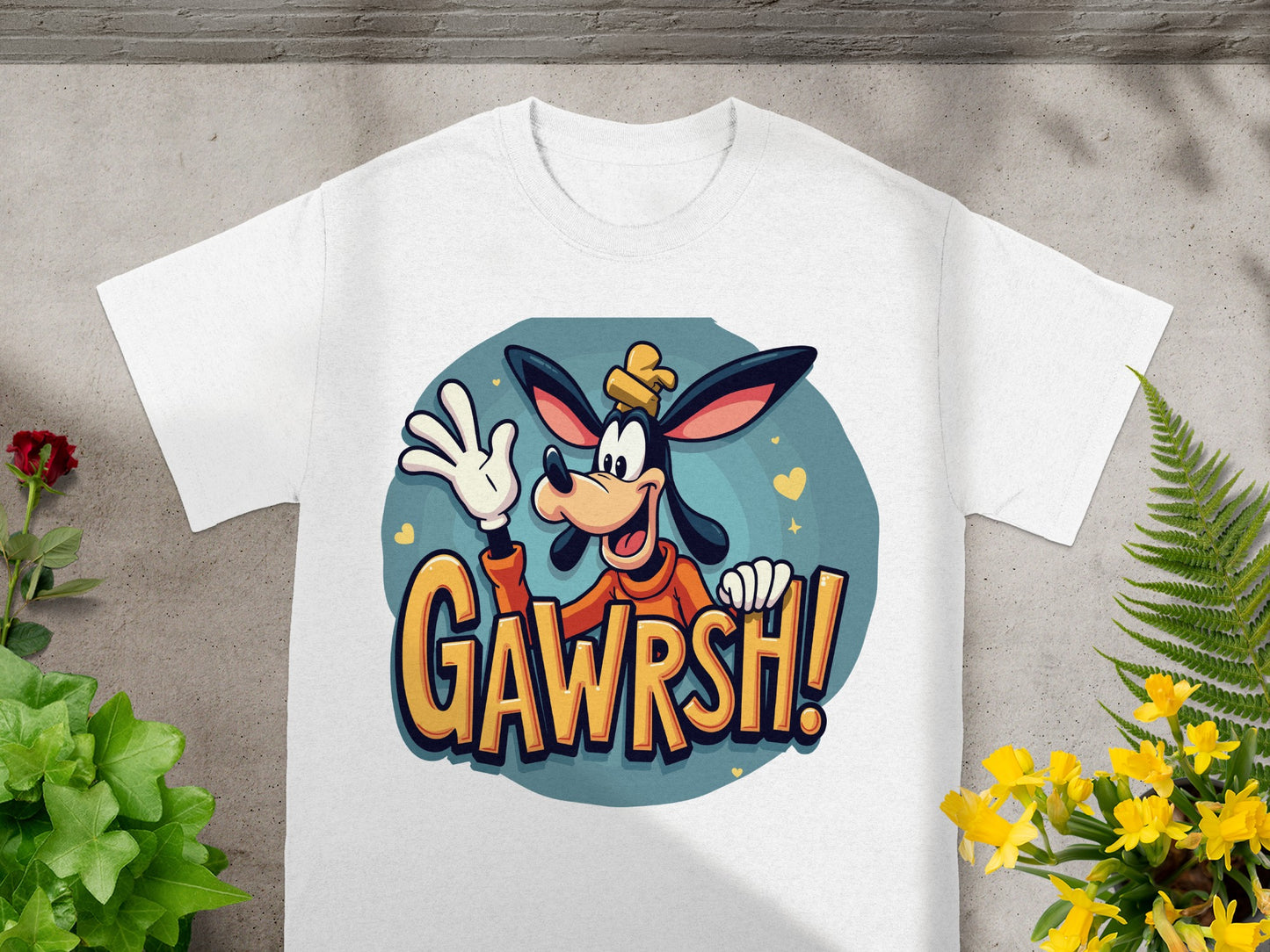 White t-shirt featuring cartoon Goofy character saying "GAWRSH!"