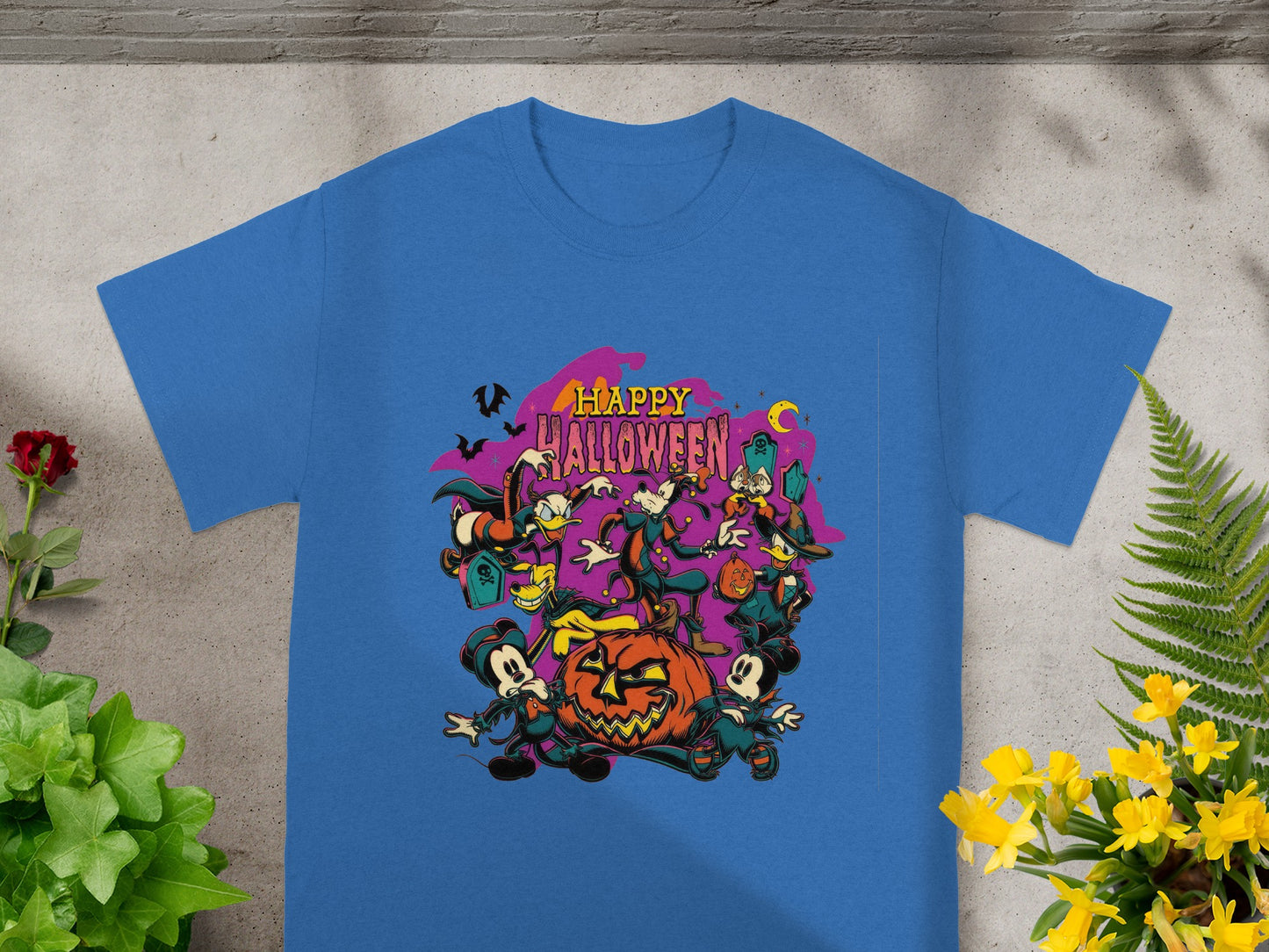 Happy Halloween graphic with Mickey, Minnie, Donald, Goofy, Pluto, and Daisy.