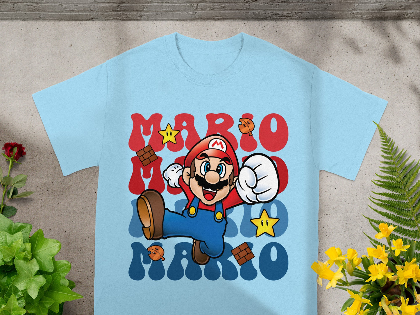 Light blue t-shirt with Mario characters and "Mario" text.