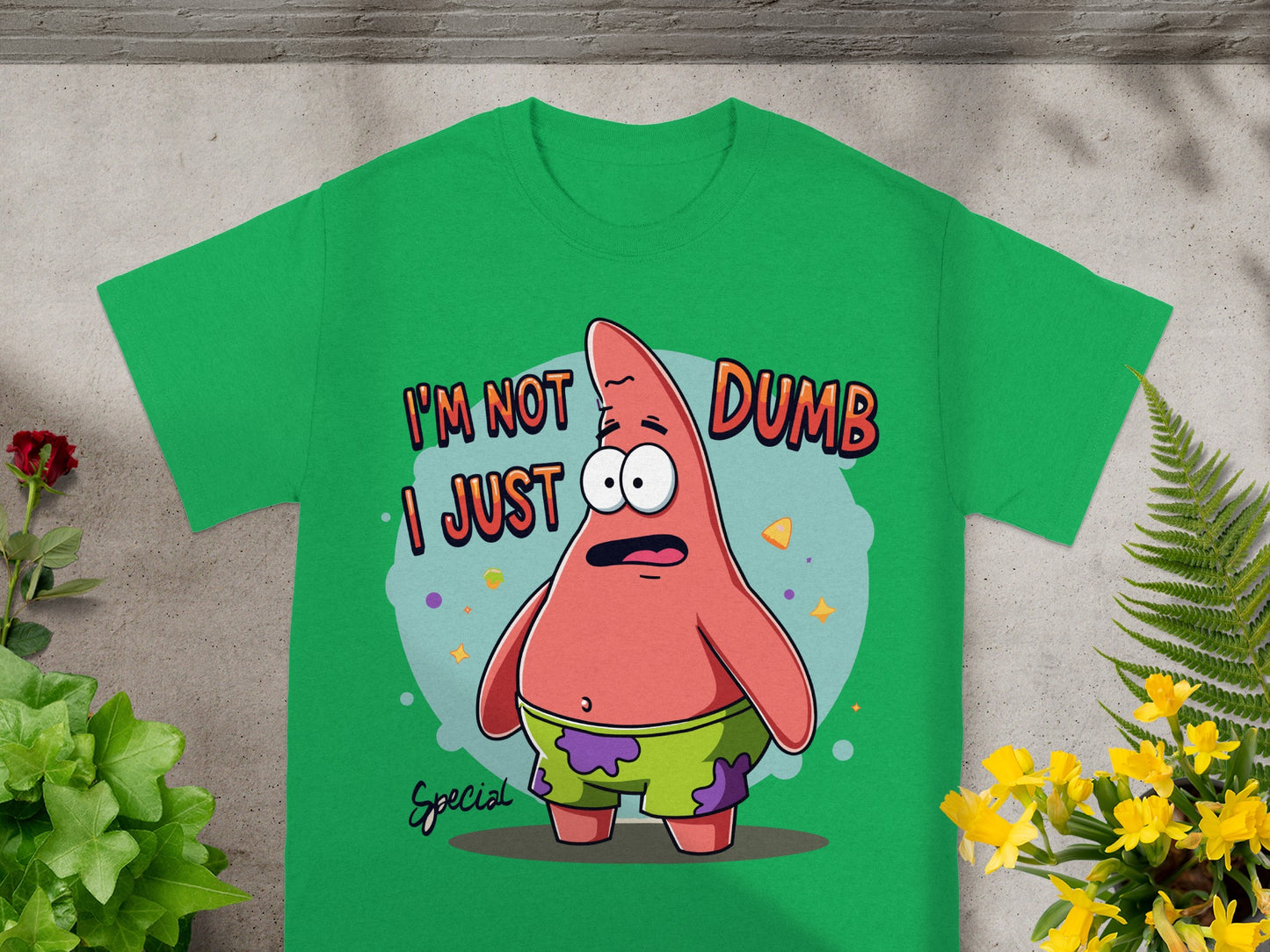 Green t-shirt with Patrick Star saying "I'm not dumb, I just".