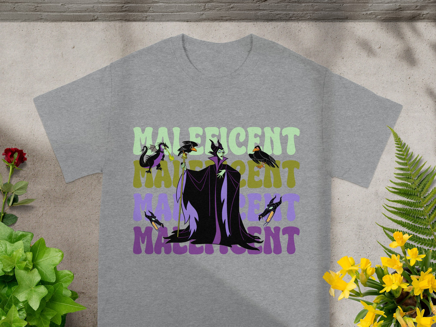 Maleficent with ravens on a grey t-shirt.