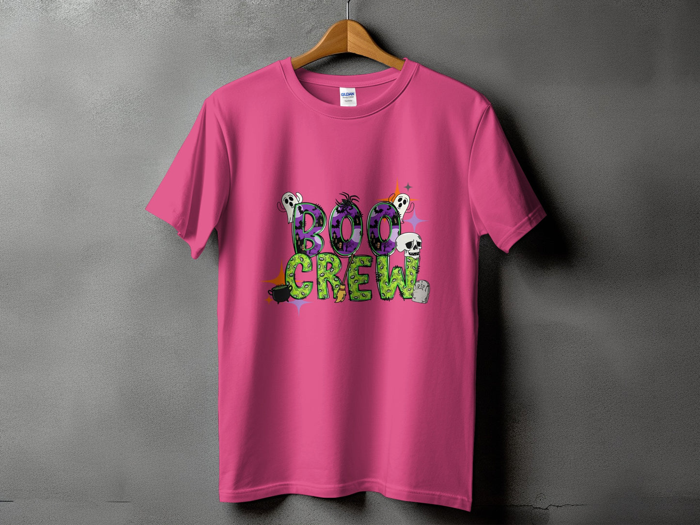 Pink t-shirt with "Boo Crew" text and Halloween graphics.