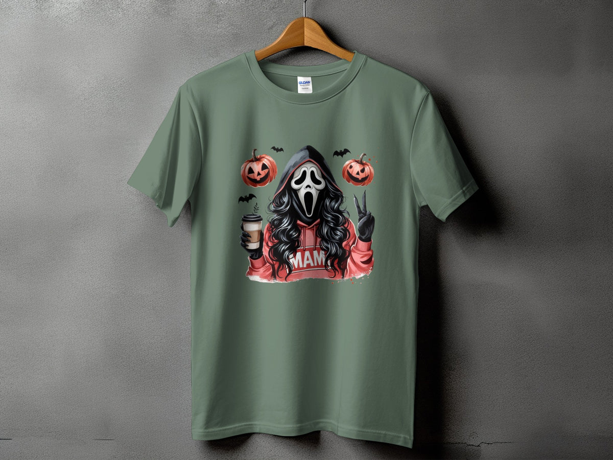 Green t-shirt with a ghost mask, pumpkins, bats, coffee, and "MAM" text.