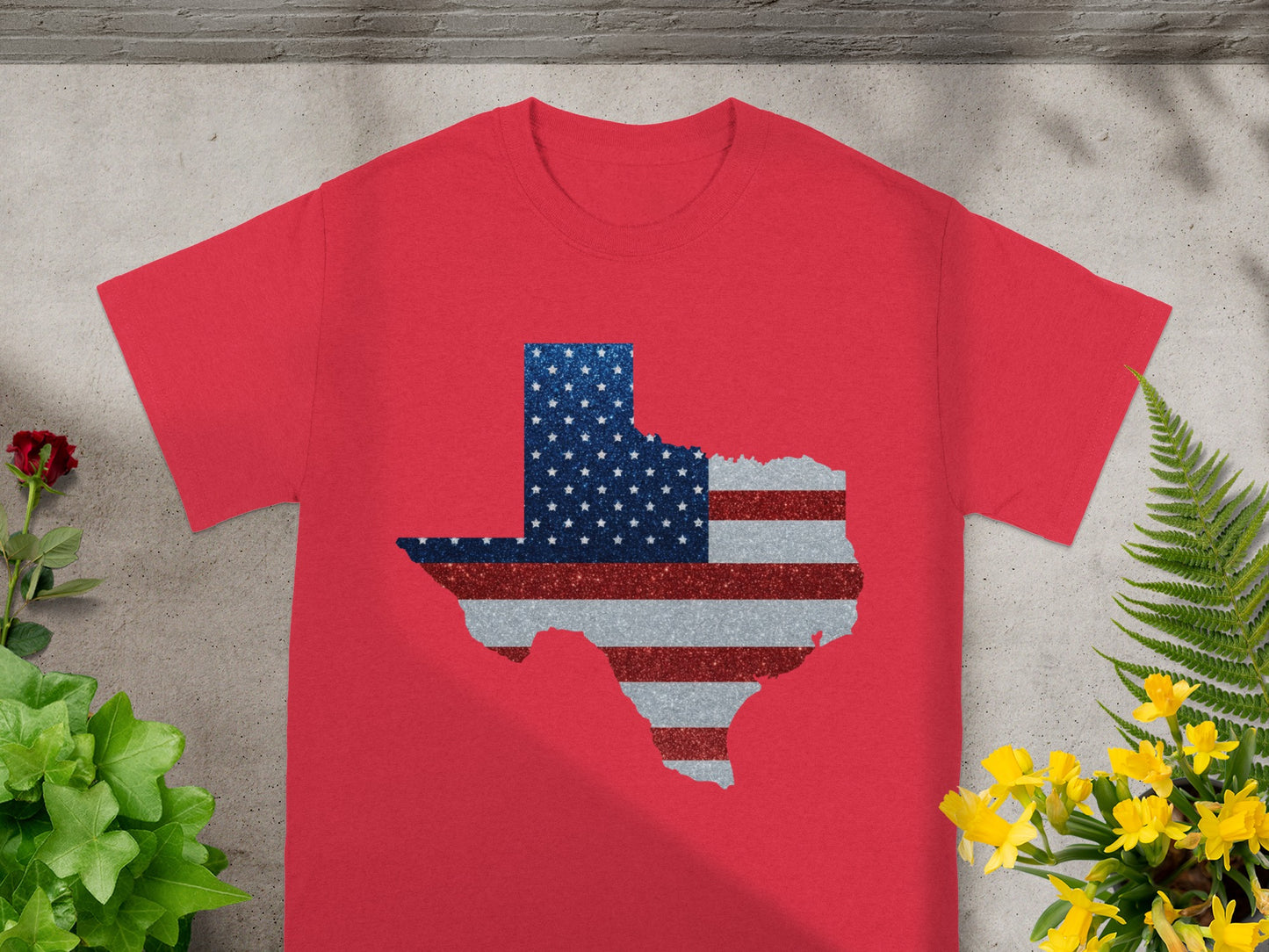 Red t-shirt with a glittery Texas outline in the U.S. flag design.