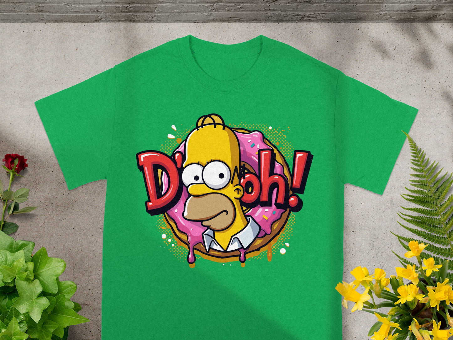 Green t-shirt with Homer Simpson saying "D'oh!" in front of a donut.