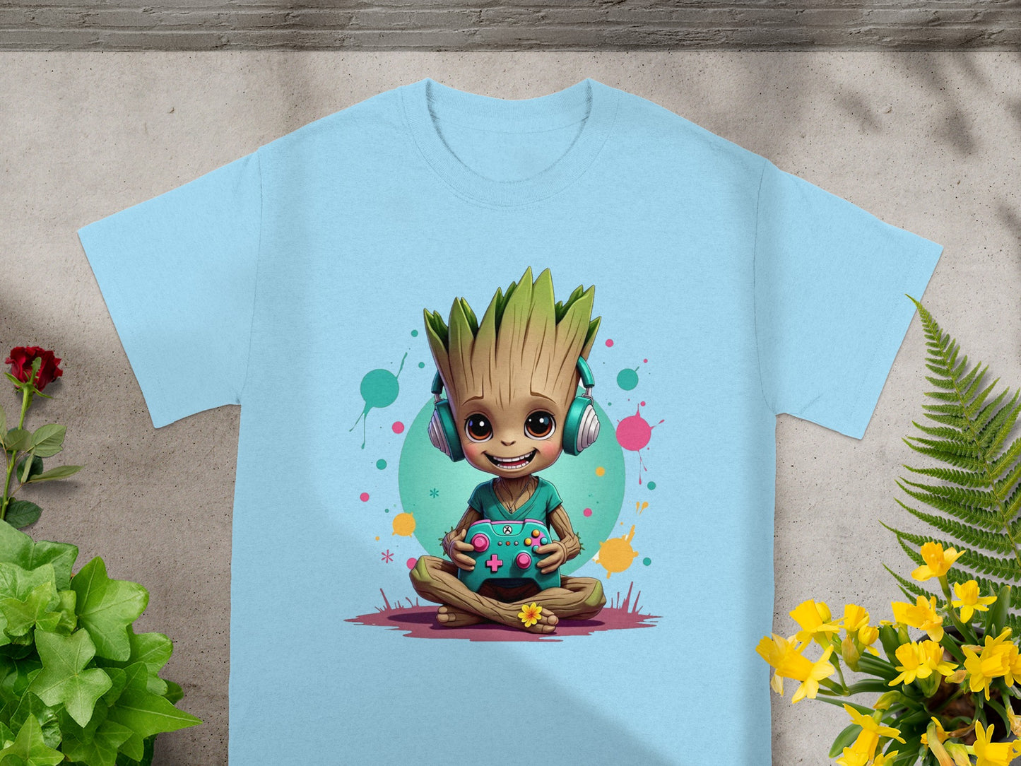 Baby Groot wearing headphones holding a video game controller.