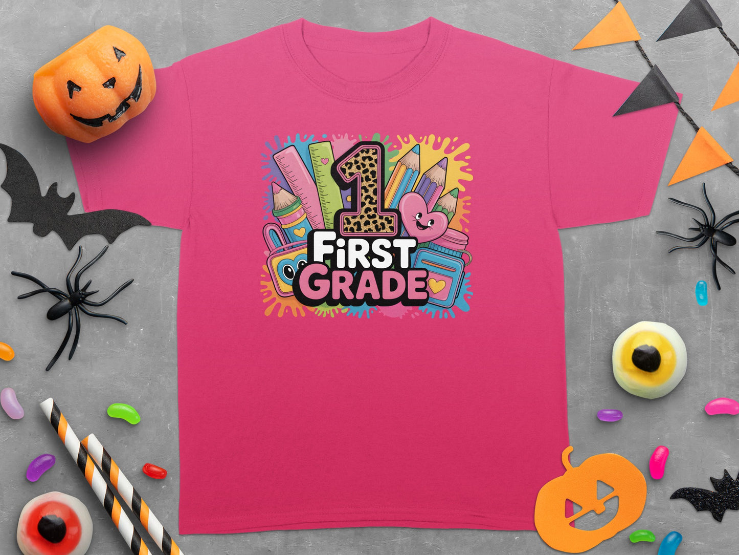 "First Grade" text with a leopard print "1" surrounded by school supplies