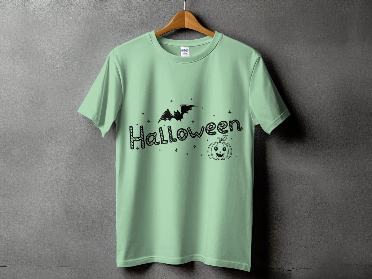 Light green t-shirt with black Halloween bat and pumpkin graphic design.