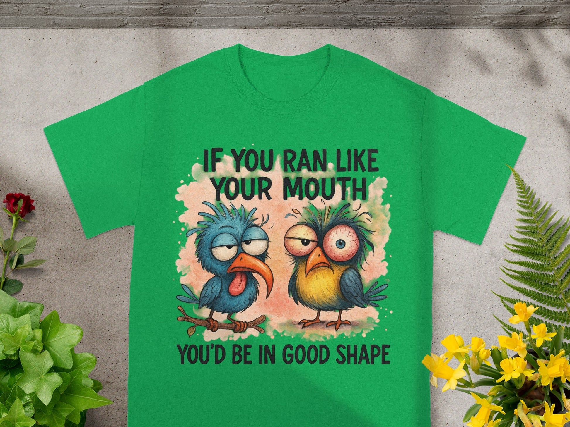 Green t-shirt with cartoon birds and text "If you ran like your mouth you'd be in good shape."