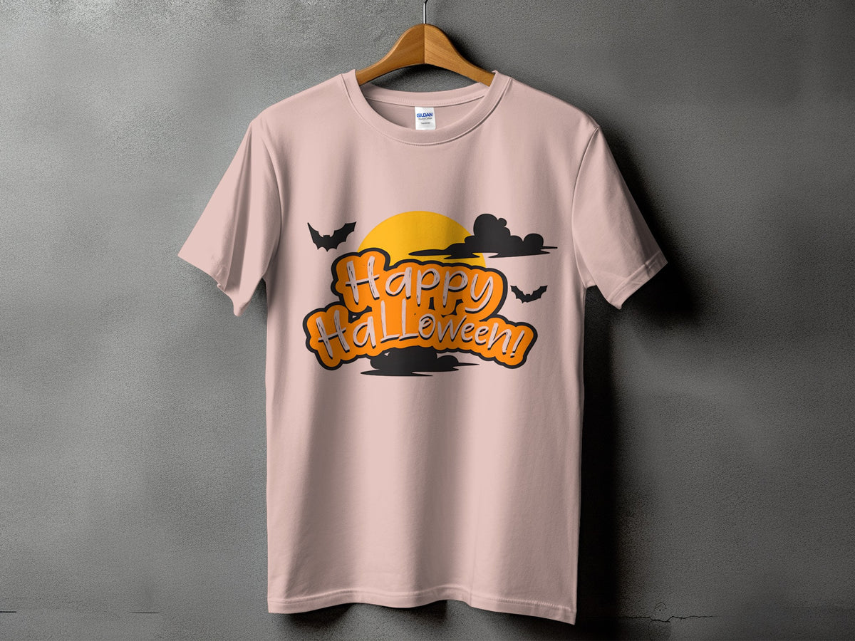 Pink t-shirt with orange "Happy Halloween!" text, a yellow sun, and bats.