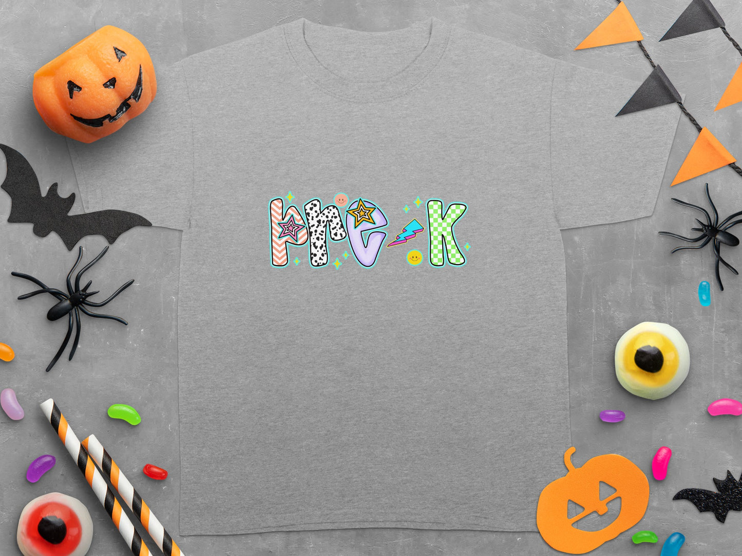 Grey t-shirt with "P.R.E K" text and Halloween decorations.
