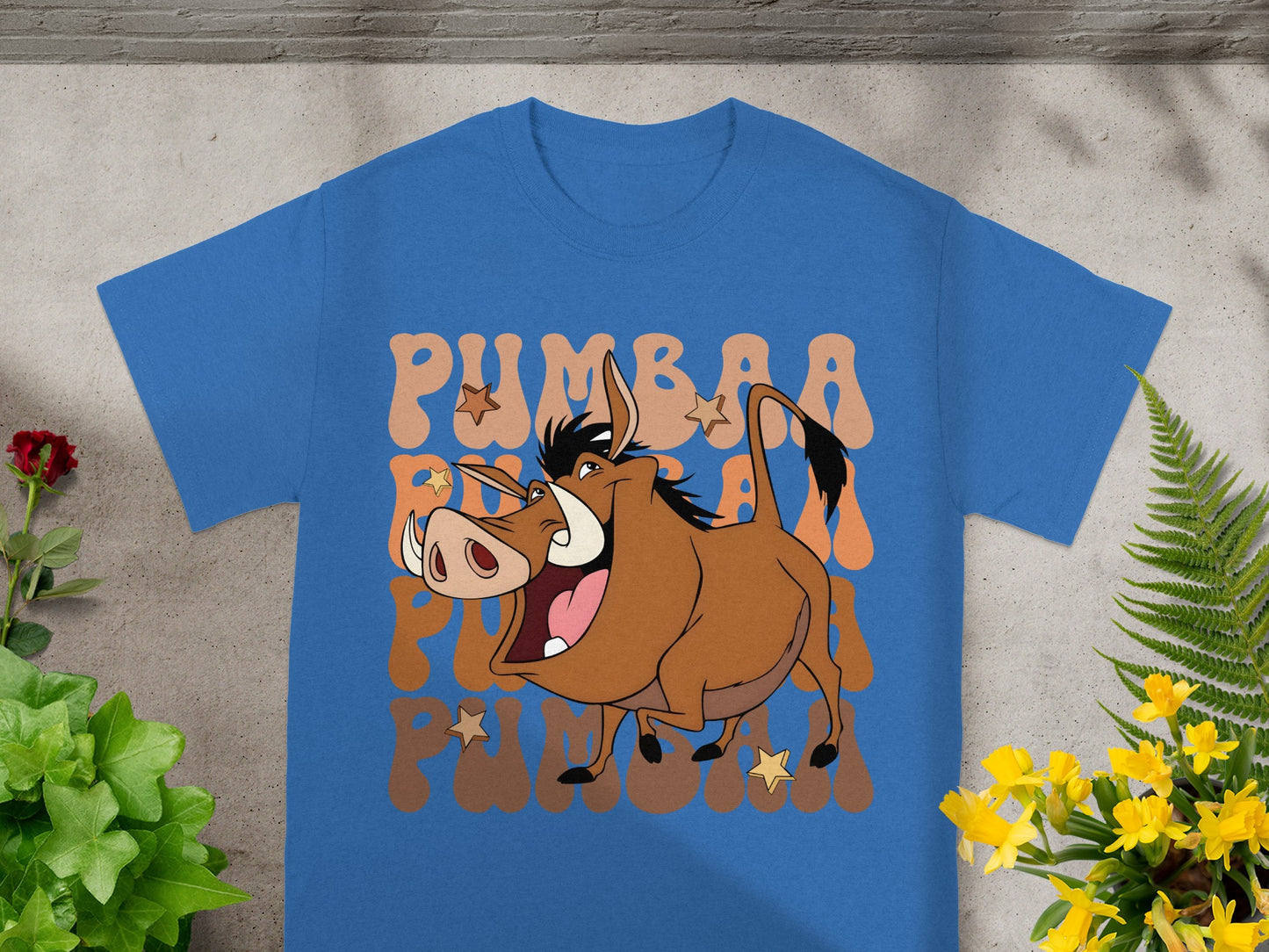 Blue t-shirt with Pumbaa character graphic and "Pumbaa" text.