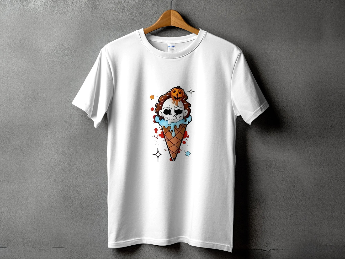 White t-shirt with a Halloween-themed ice cream cone graphic featuring a skull and pumpkin.