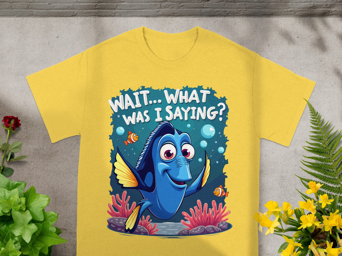 Yellow t-shirt with Dory character and "WAIT... WHAT WAS I SAYING?" text.