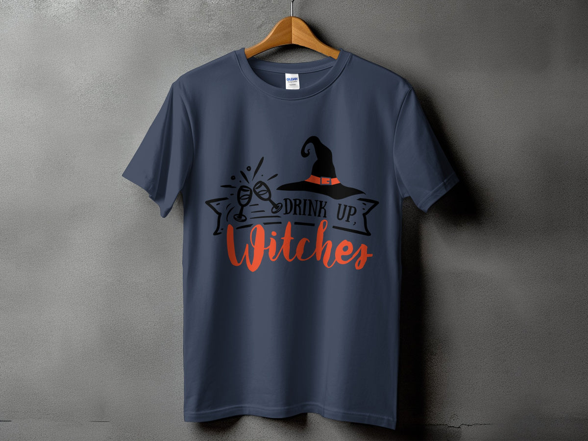 Dark blue t-shirt with "Drink Up, Witches" text and witch hat graphic.