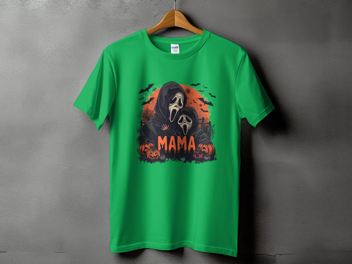 Green t-shirt with "Mama" text and spooky ghost characters with pumpkins.