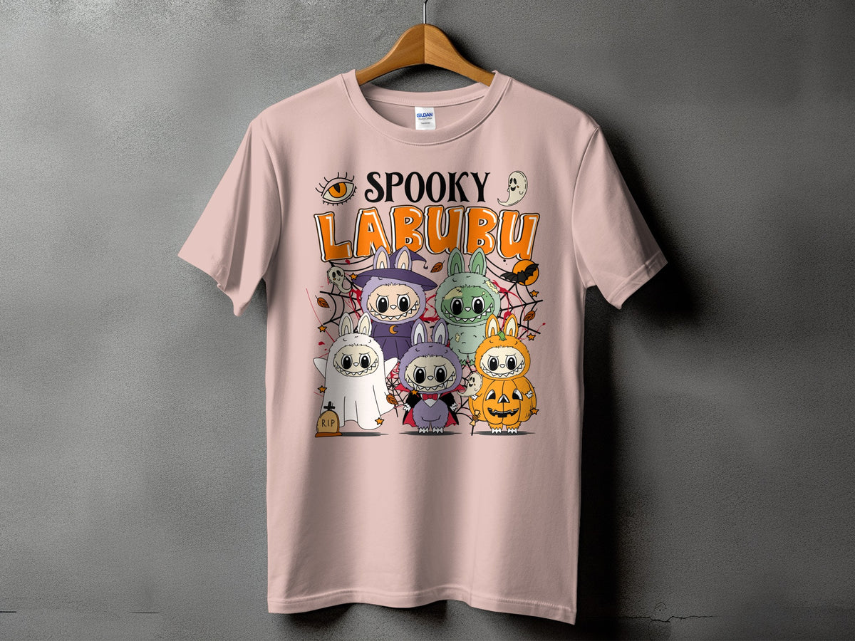 Pink t-shirt with "Spooky Labubu" text and five cute Halloween characters.