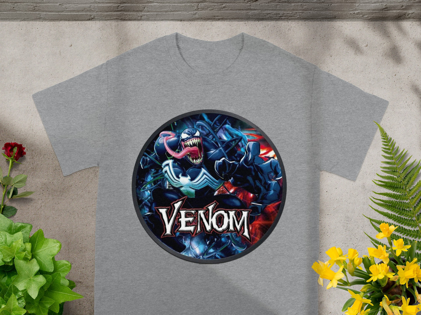 Grey t-shirt with Venom Marvel comic character logo centered on chest.
