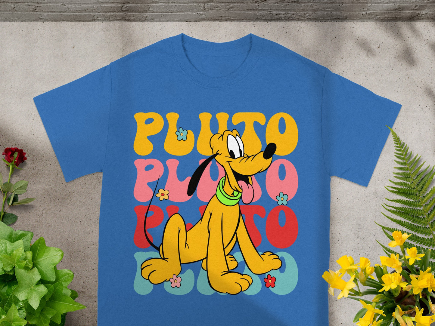 Blue t-shirt with Pluto cartoon character and colorful "Pluto" text.