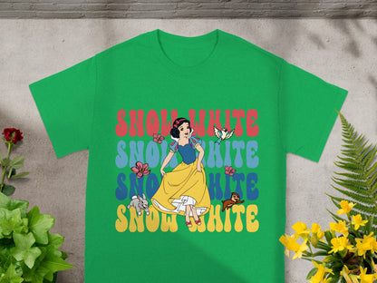 Green t-shirt with Snow White graphic and "Snow White" text in colorful blocks.
