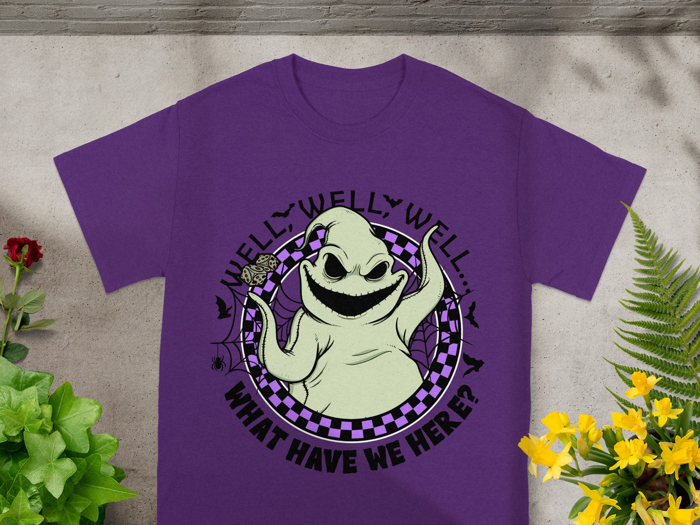 Purple t-shirt with Oogie Boogie graphic saying "Well, well, well... What have we here?"