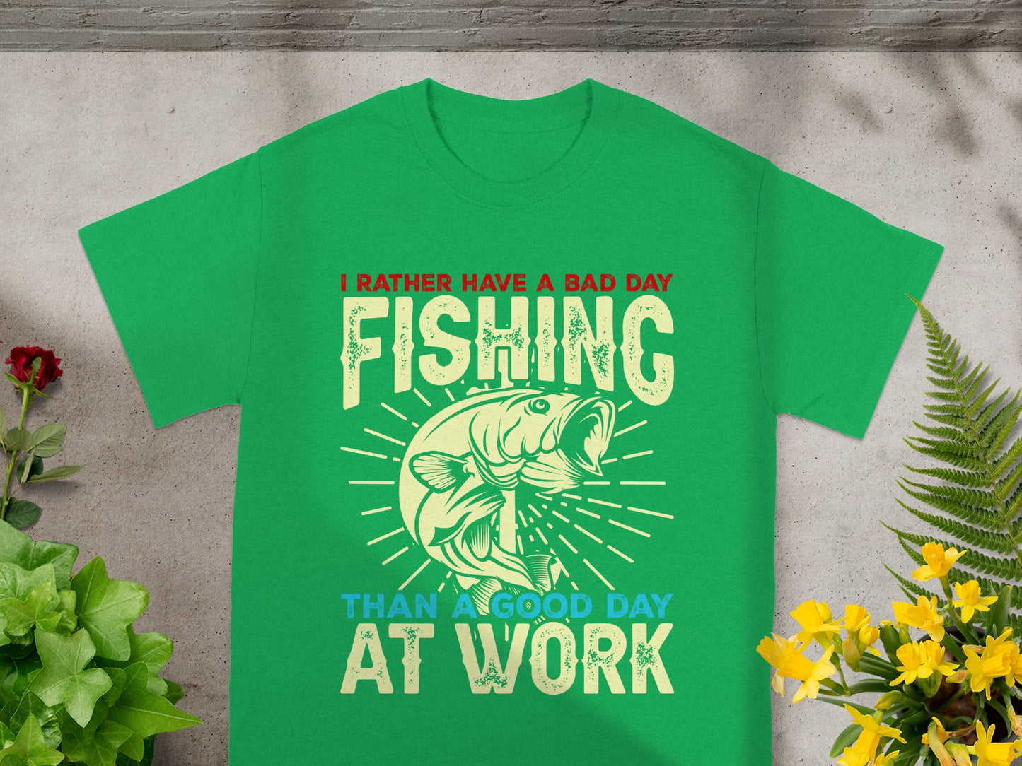 Green t-shirt with "I Rather Have A Bad Day Fishing Than A Good Day At Work" slogan and fish.