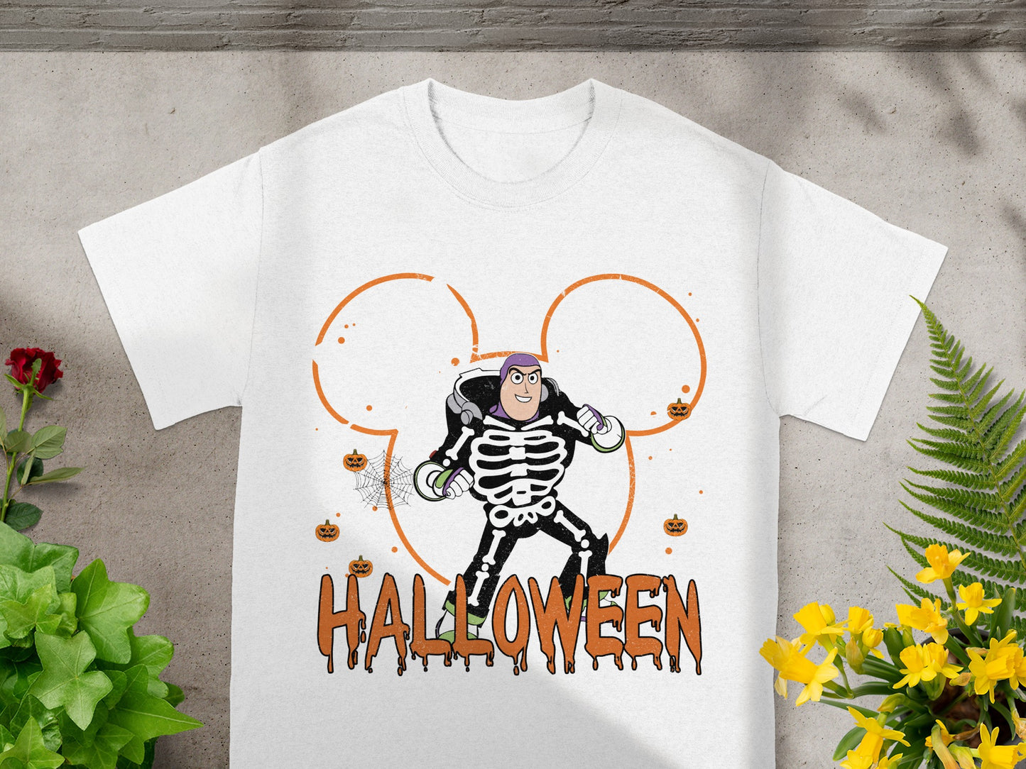 Buzz Lightyear in skeleton costume with "Halloween" text and Mickey ears graphic.
