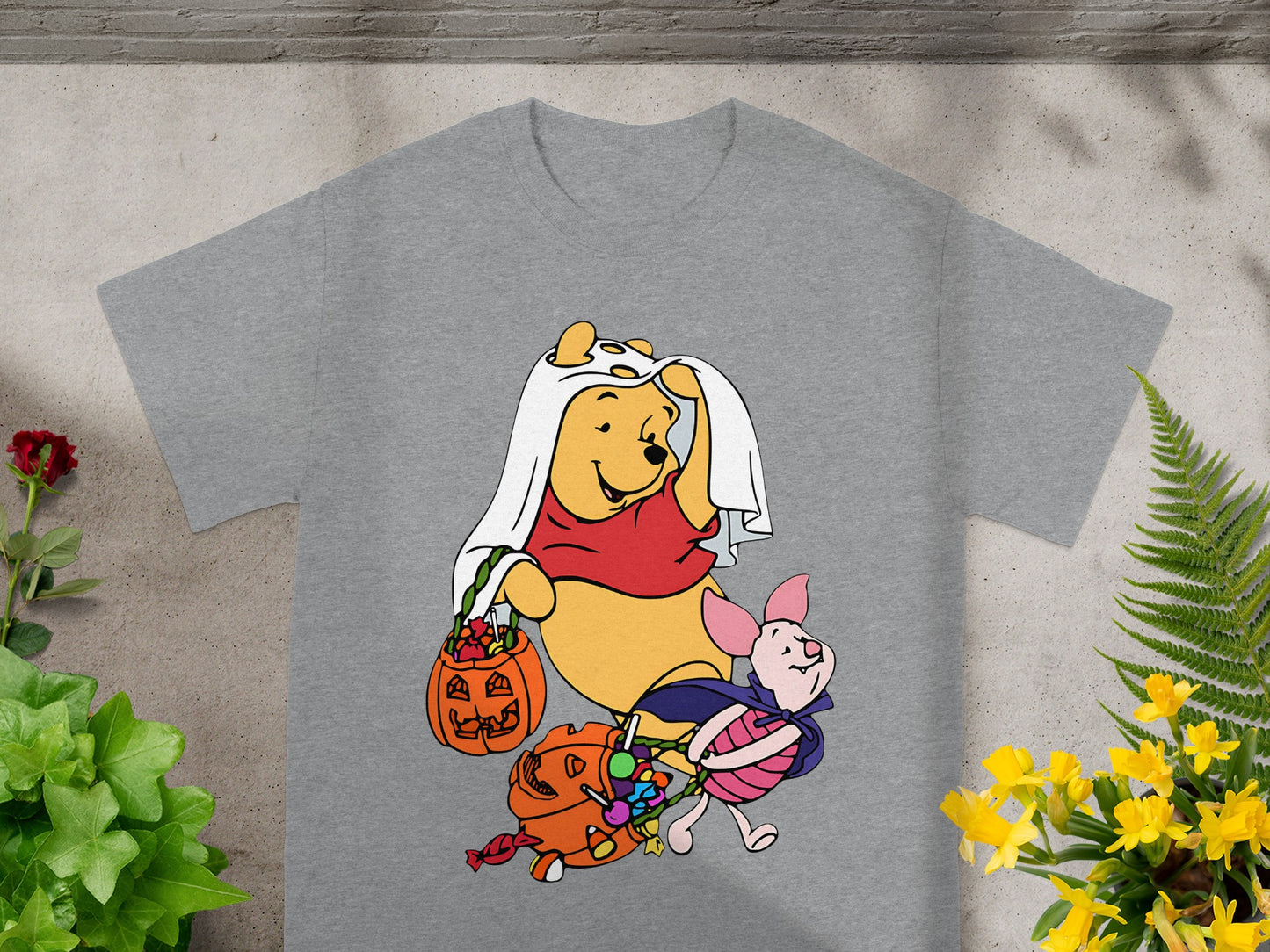 Winnie the Pooh and Piglet trick-or-treating with candy and pumpkins.