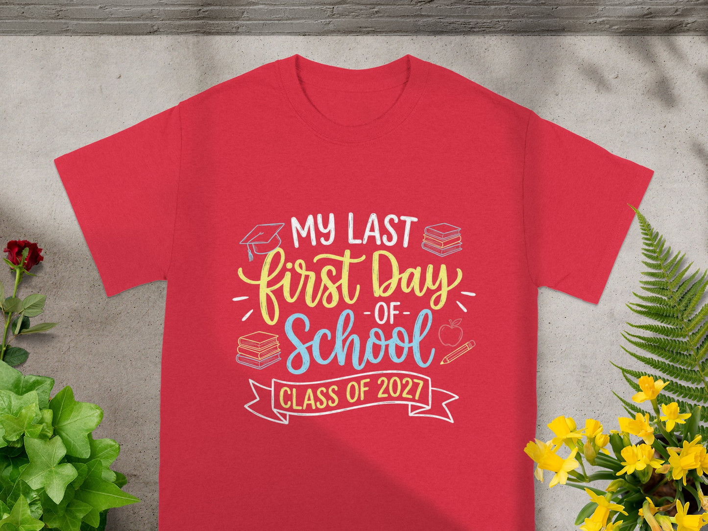 Red t-shirt with "My Last First Day - Of - School 2027" graphic.