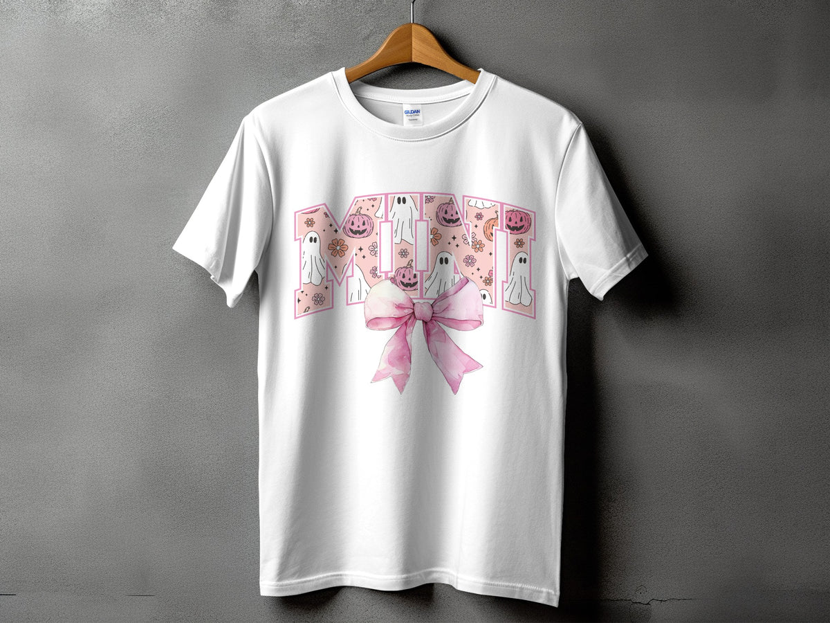 White t-shirt with "MOM" text and Halloween ghosts, pumpkins, and pink bow.