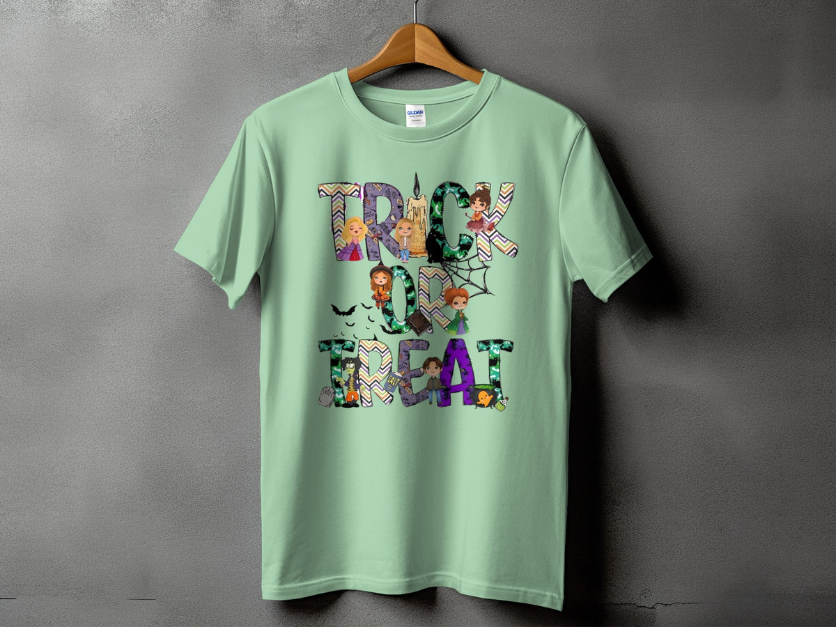 Light green t-shirt with "Trick or Treat" text and Halloween-themed cartoon characters.