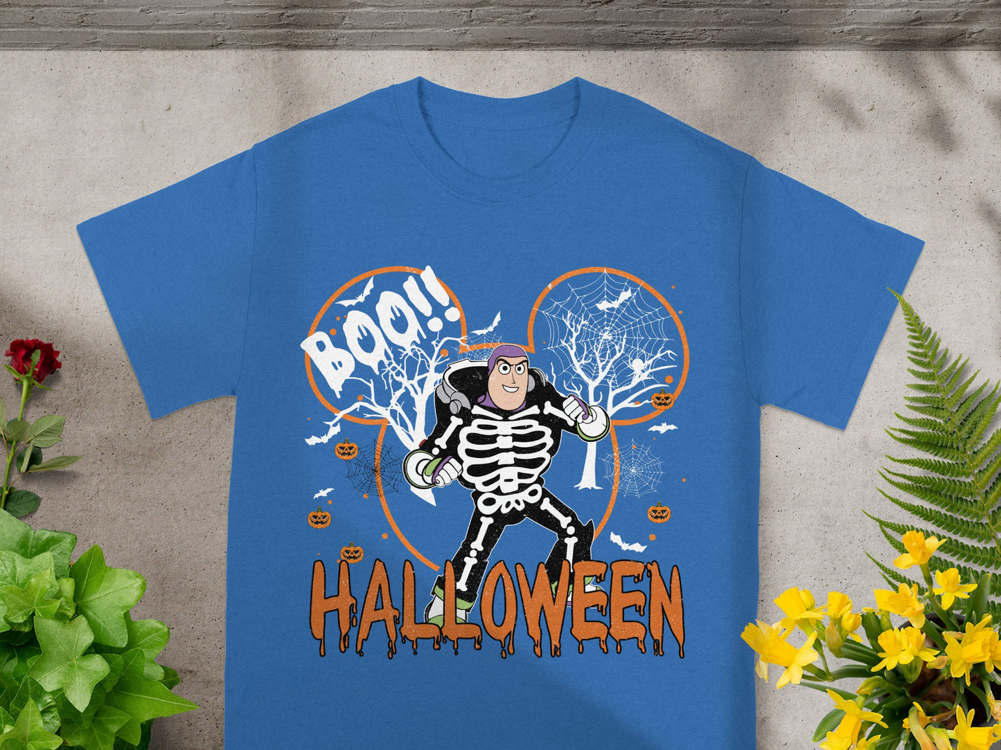Buzz Lightyear skeleton costume graphic with "Boo!!" and "Halloween" text.
