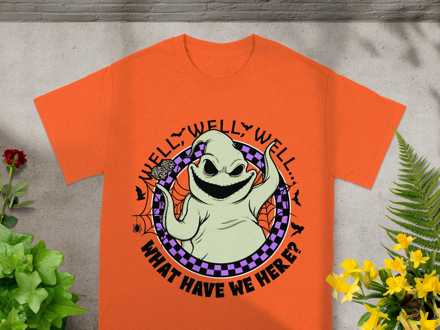 Orange t-shirt with Oogie Boogie character and text "Well, Well, Well... What Have We Here?".