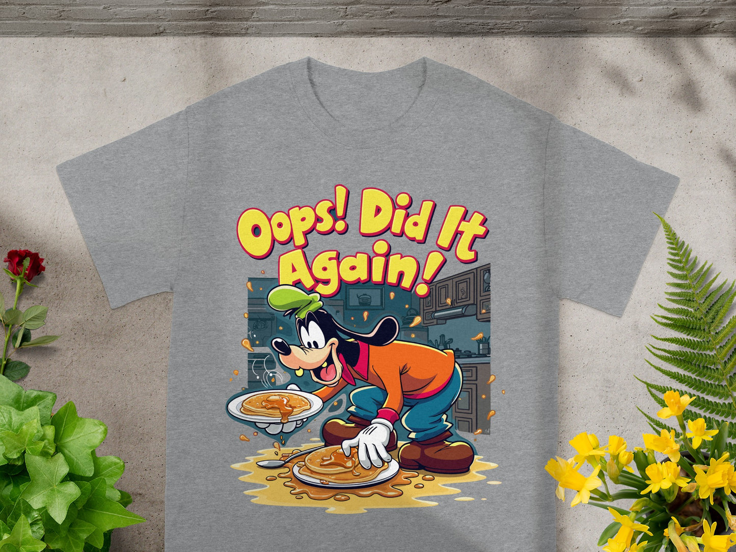Goofy character in cartoon style holding pancakes, with text "Oops! Did it Again!".