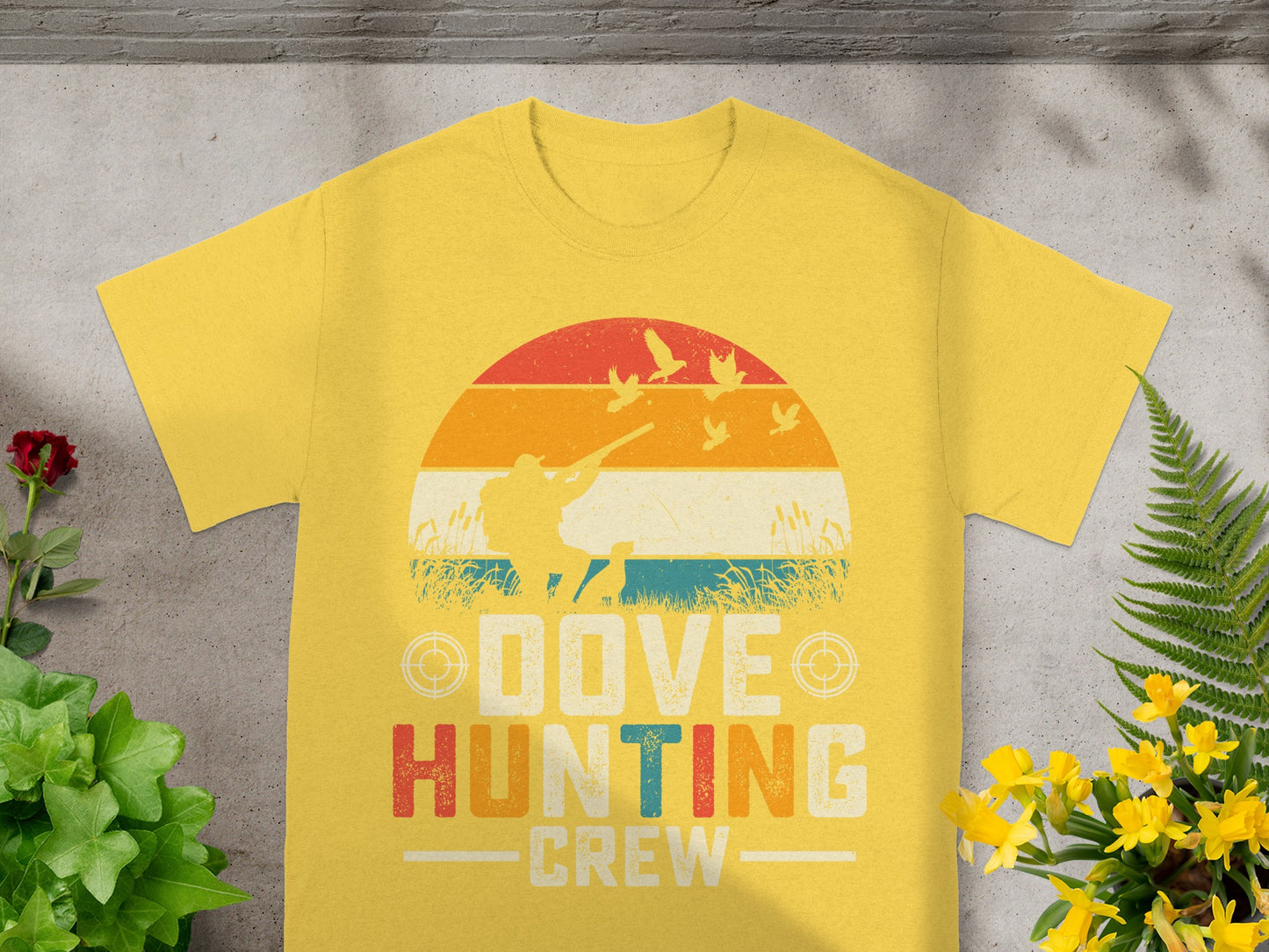Yellow t-shirt with retro graphic of dove hunting crew and hunter.