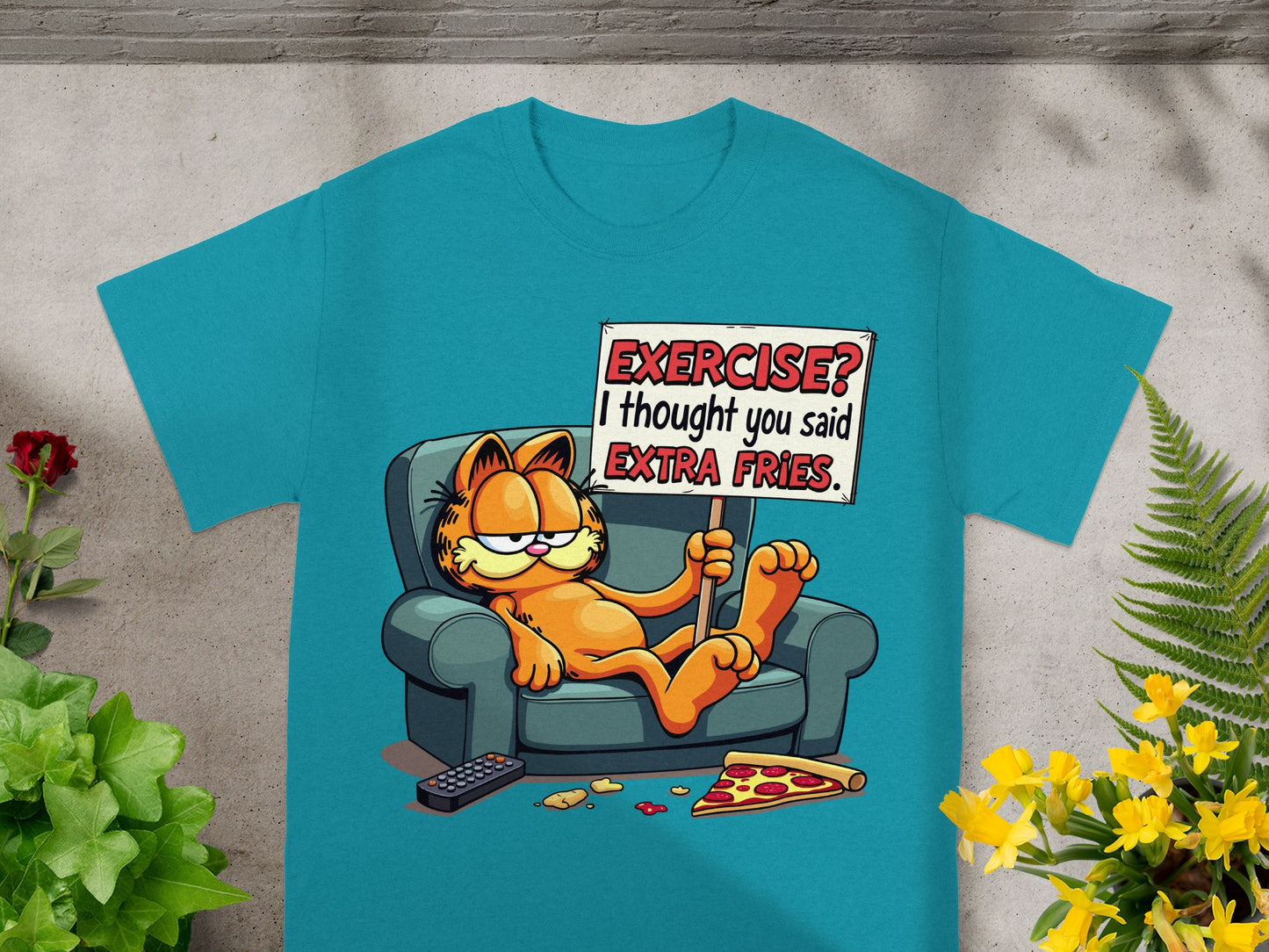 Garfield on couch with sign "Exercise? I thought you said extra fries."