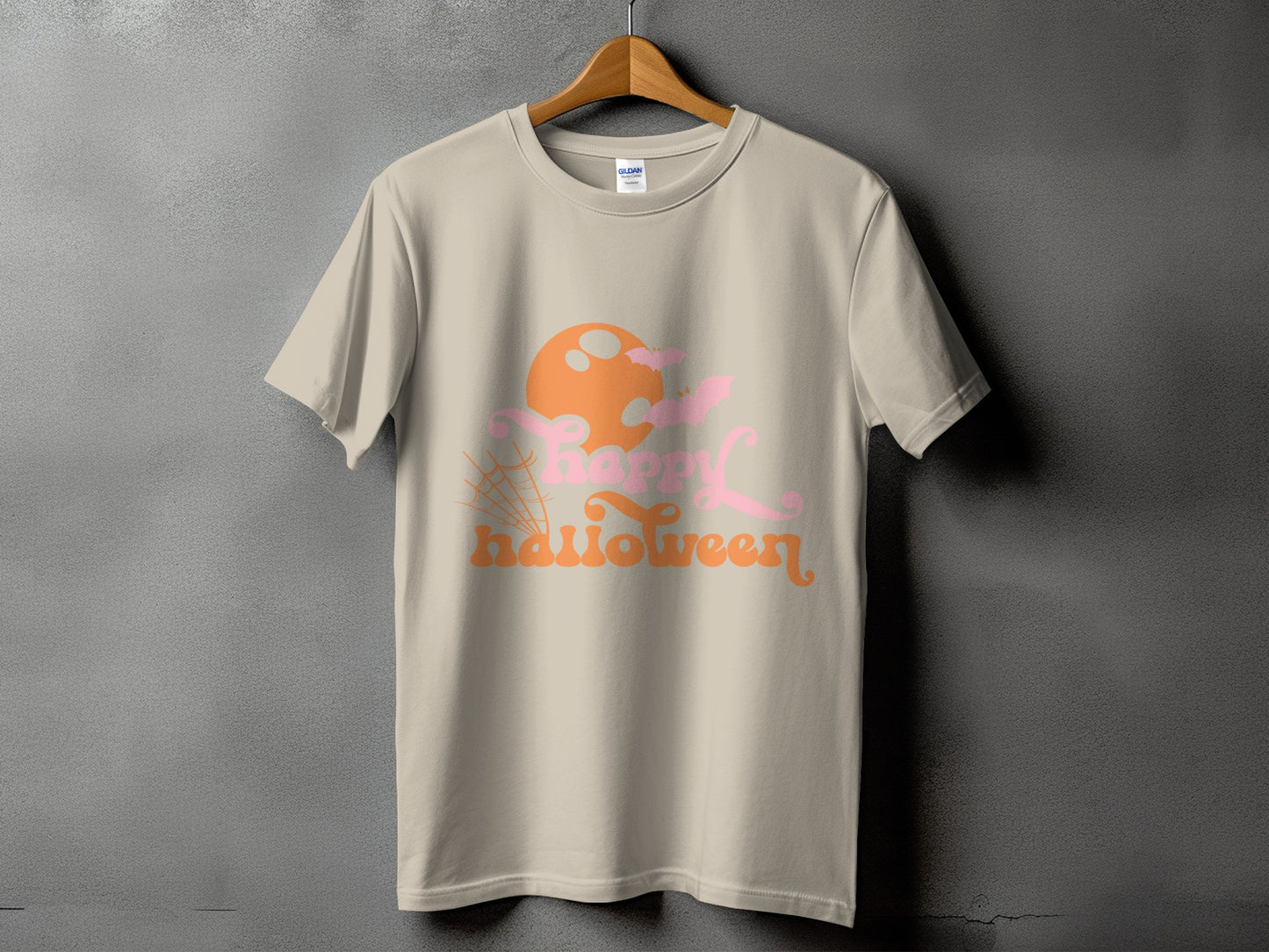 Beige t-shirt with "happy halloween" text, moon, and bats graphic.