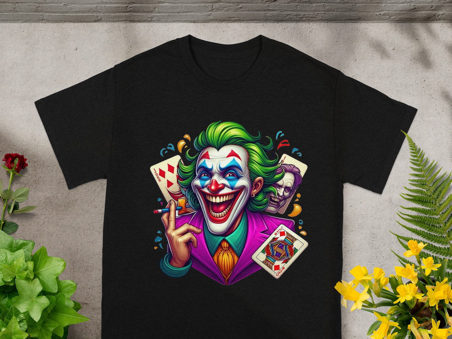 Black t-shirt featuring a vibrant graphic of the Joker with playing cards.