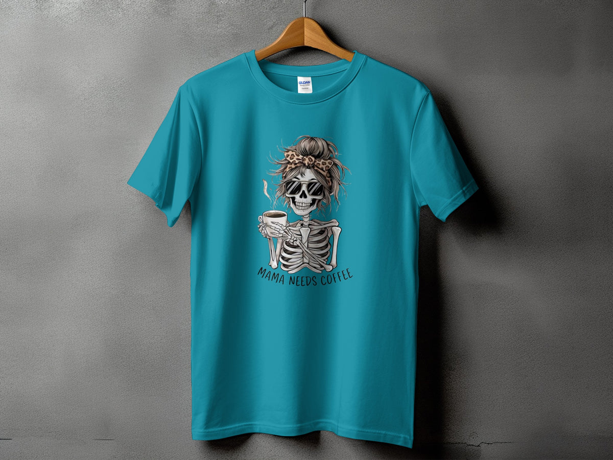 Teal t-shirt with skeleton wearing sunglasses and leopard print bandana holding coffee, text "Mama Needs Coffee."